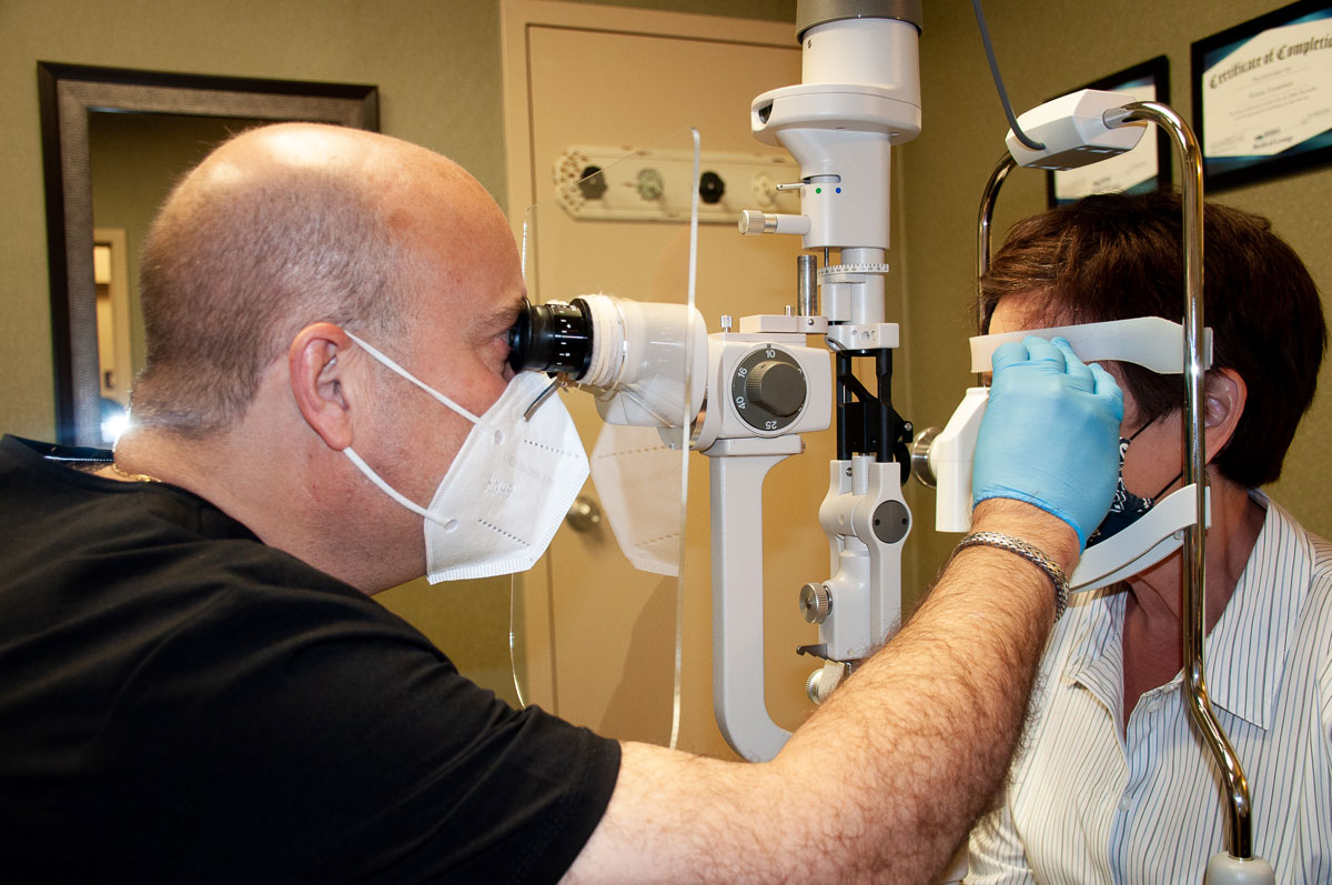 Dr. Corbin and his patients wear masks and gloves throughout the exam.